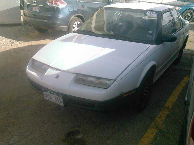 Saturn SL