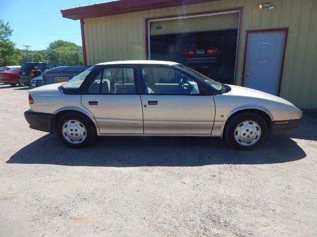 Saturn SL