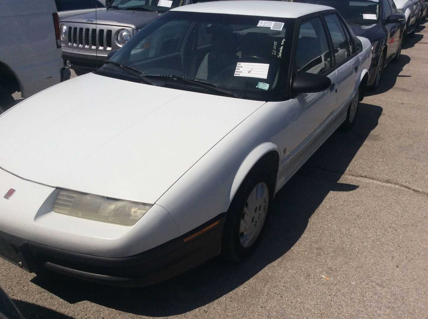 Saturn SL