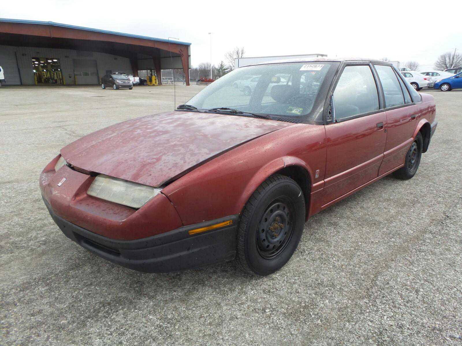 Saturn SL