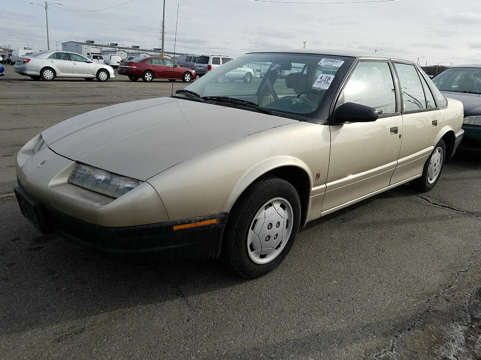 Saturn SL