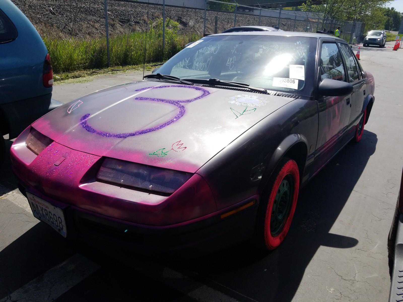 Saturn SL1