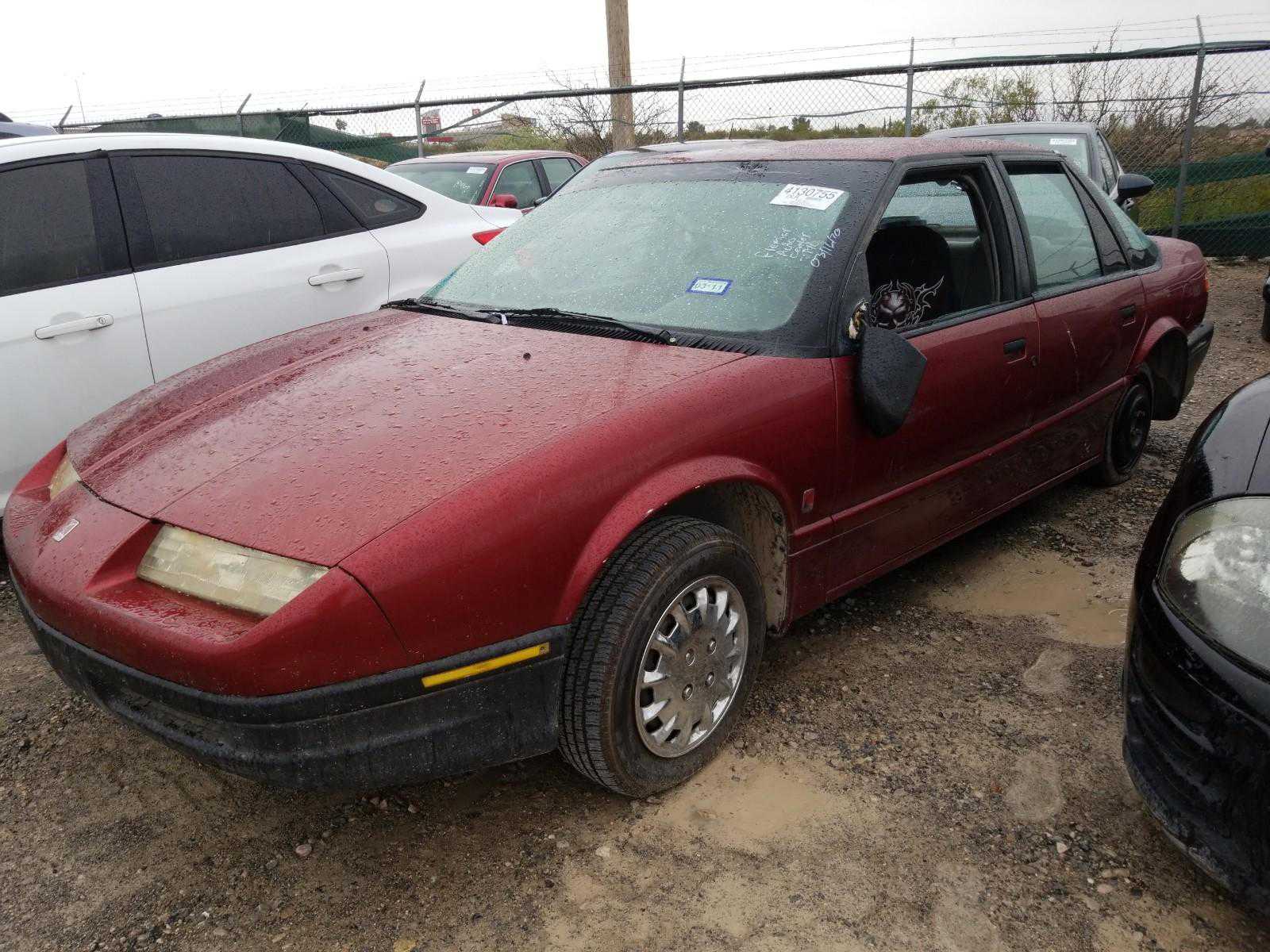 Saturn SL1