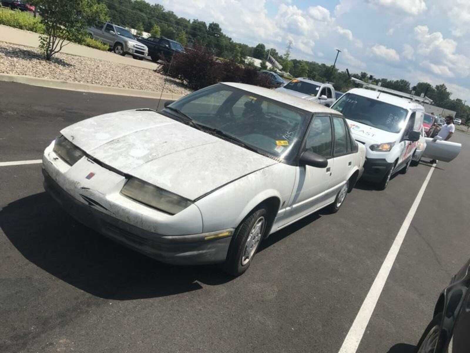 Saturn SL1