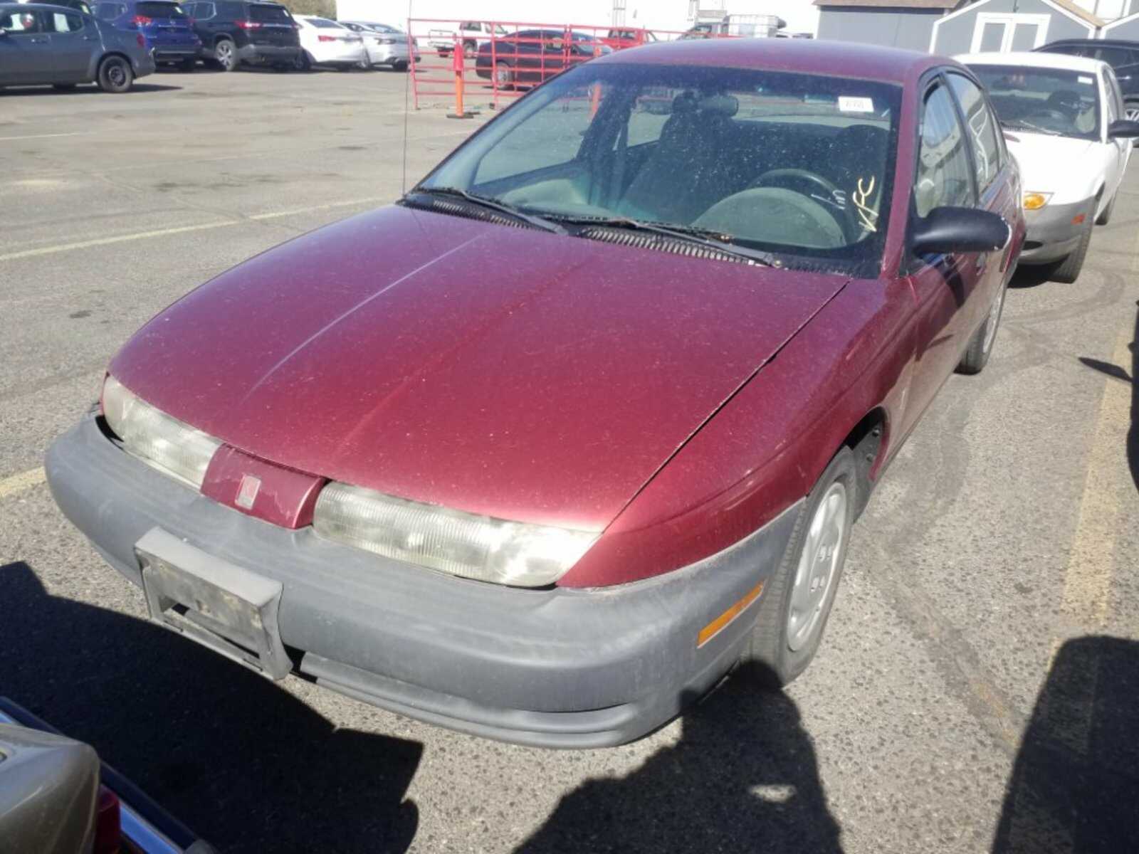 Saturn SL