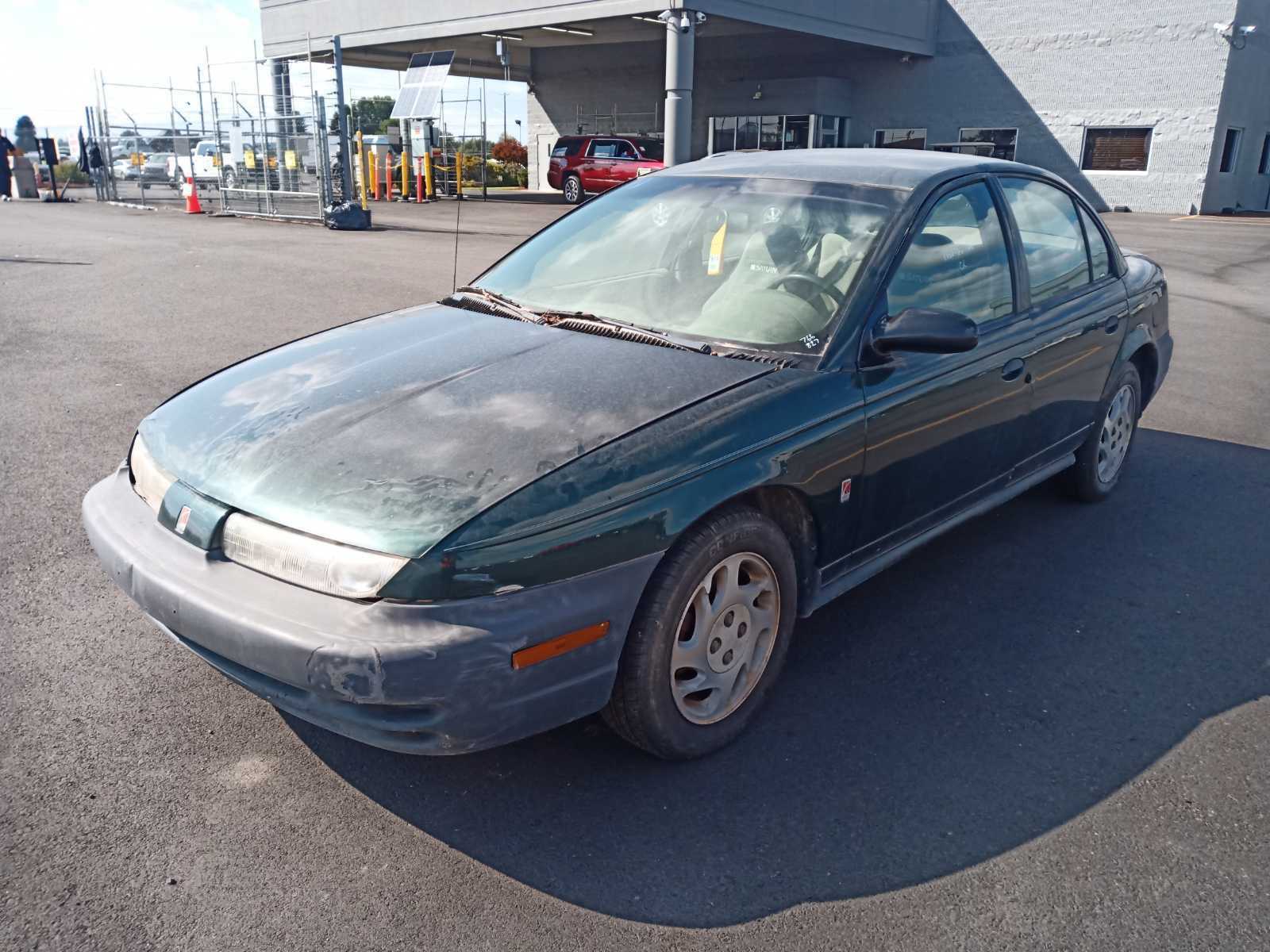 Saturn SL