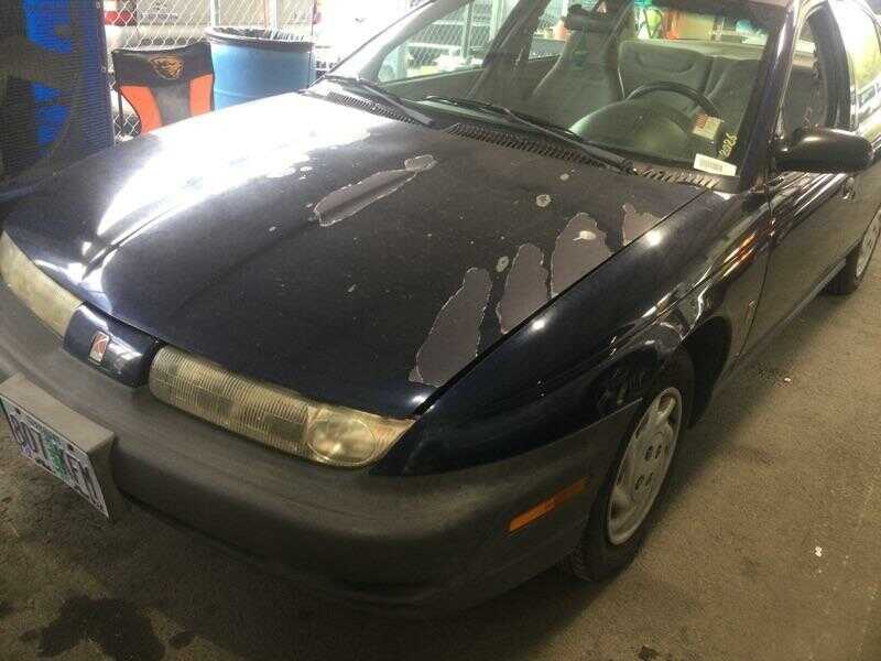 Saturn SL