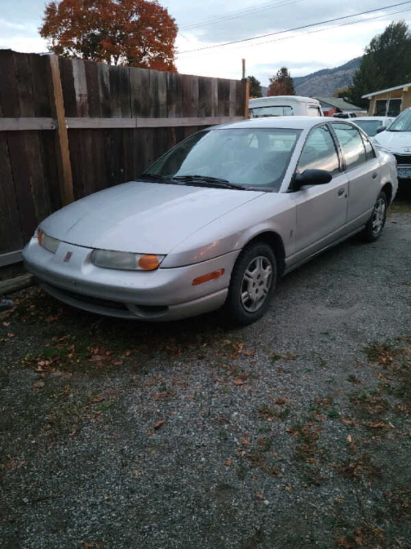 Saturn SL