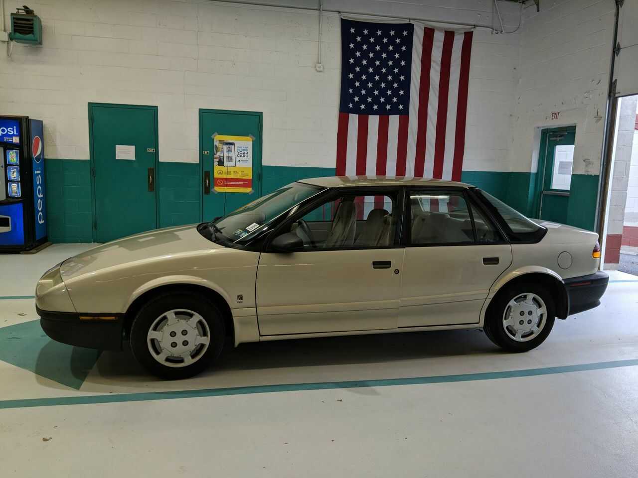 Saturn SL1