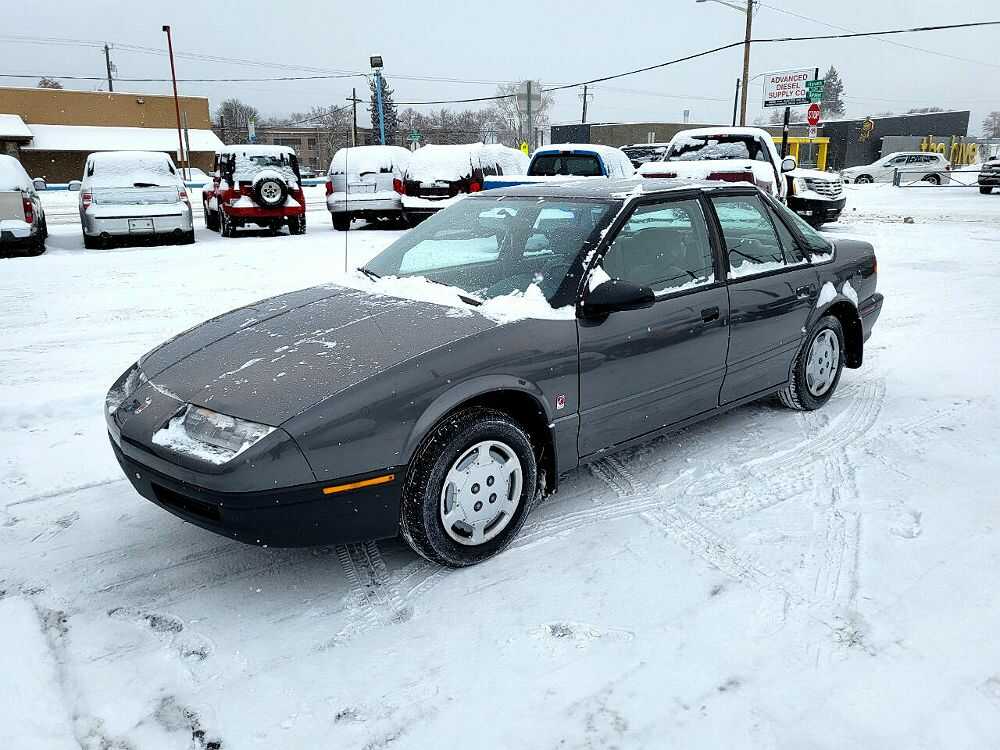 Saturn SL1