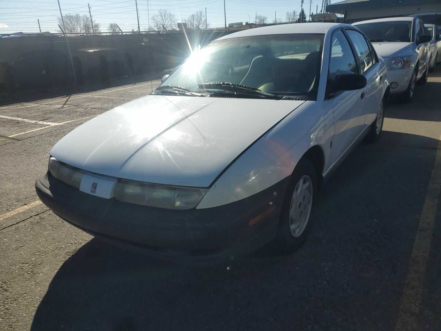 Saturn SL