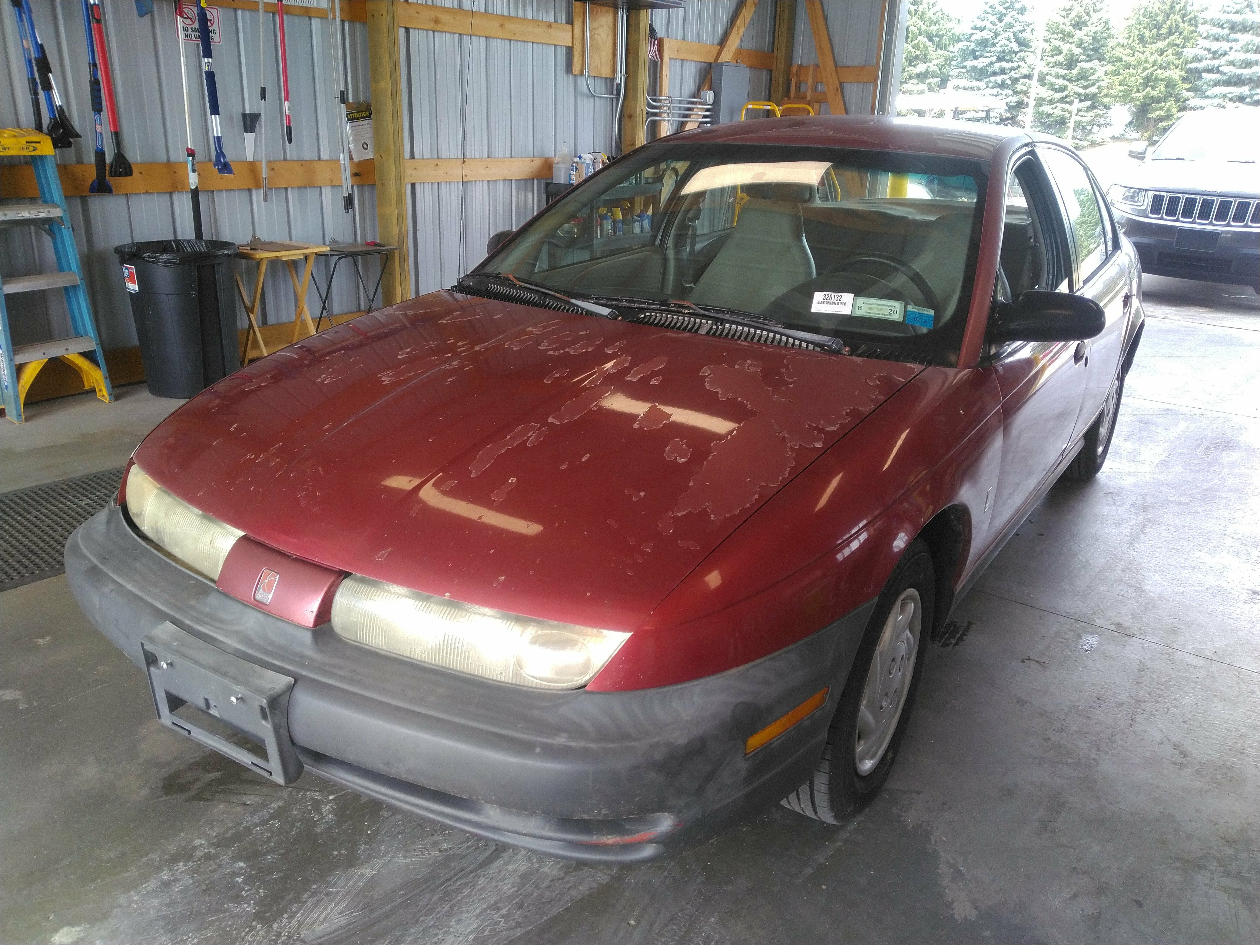 Saturn SL