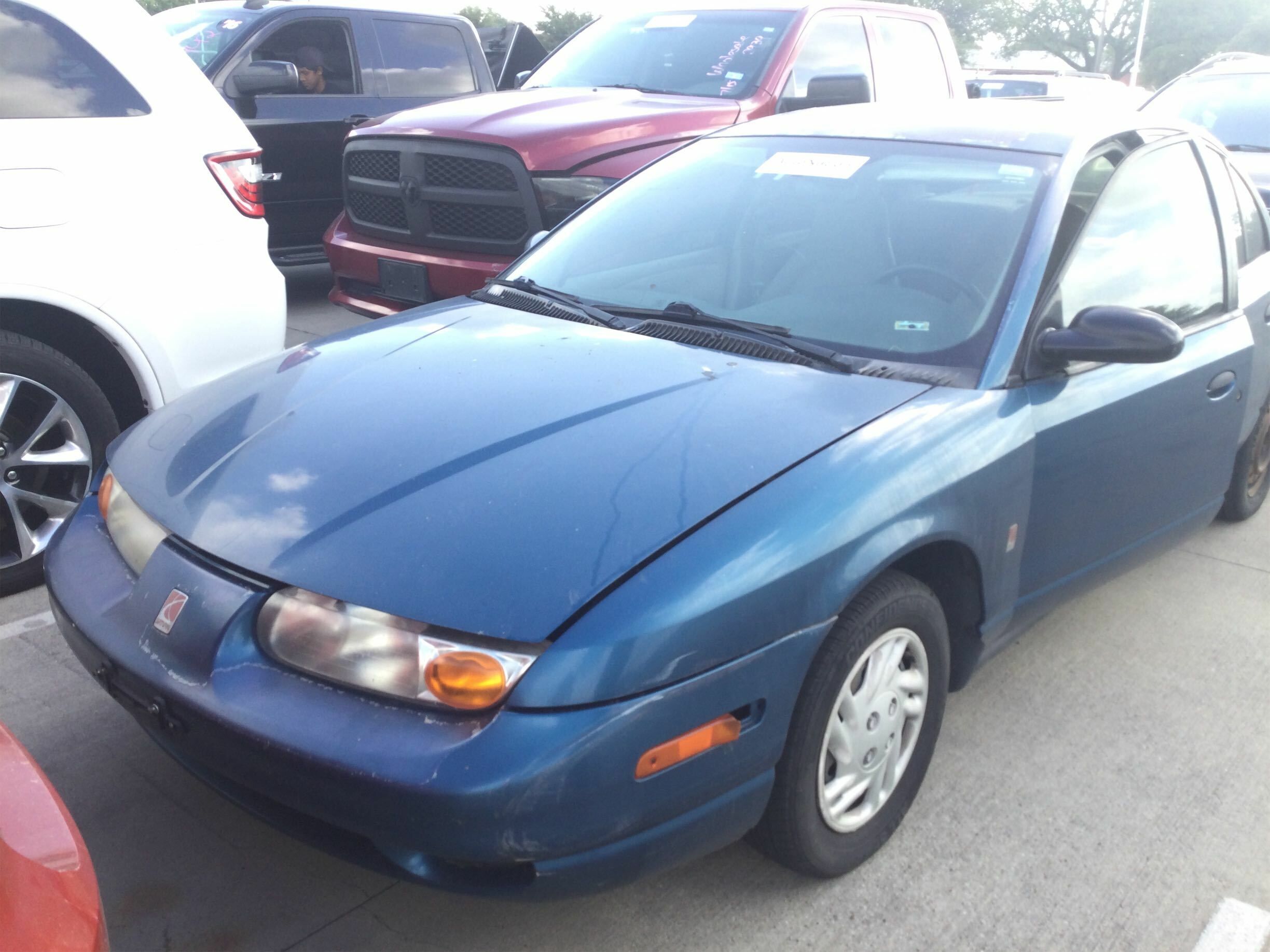 Saturn SL