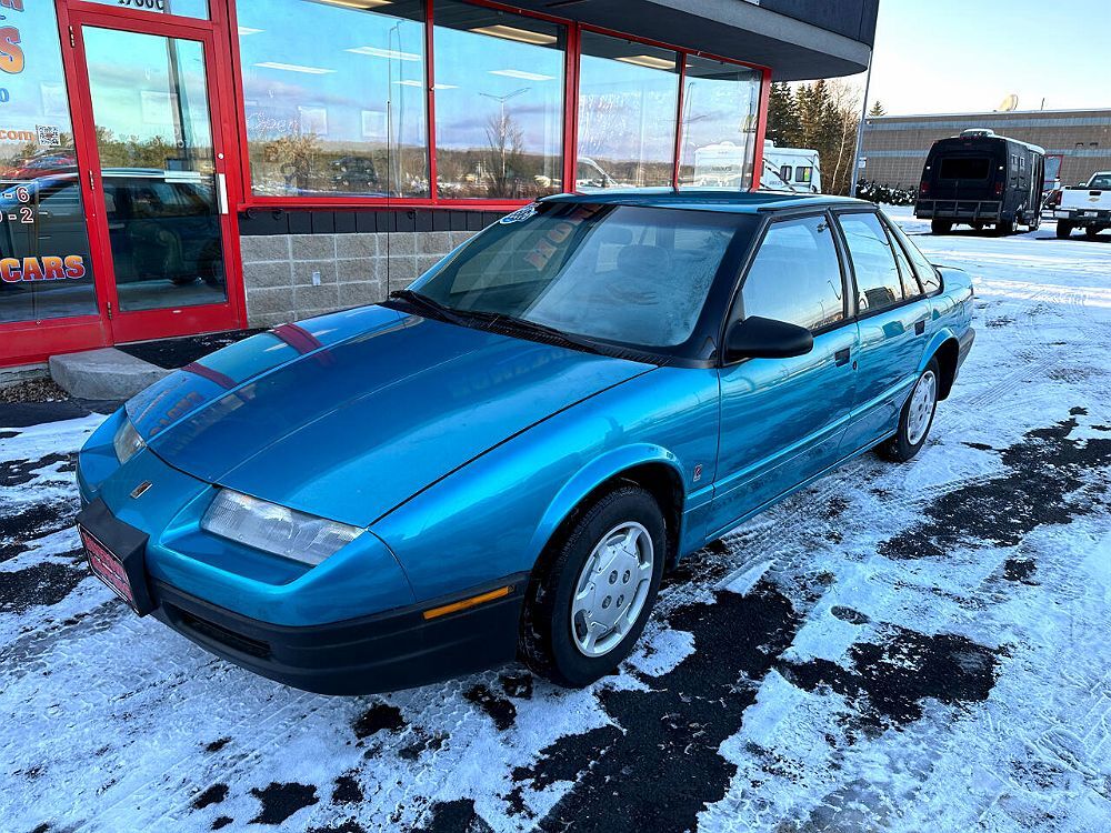 Saturn SL1