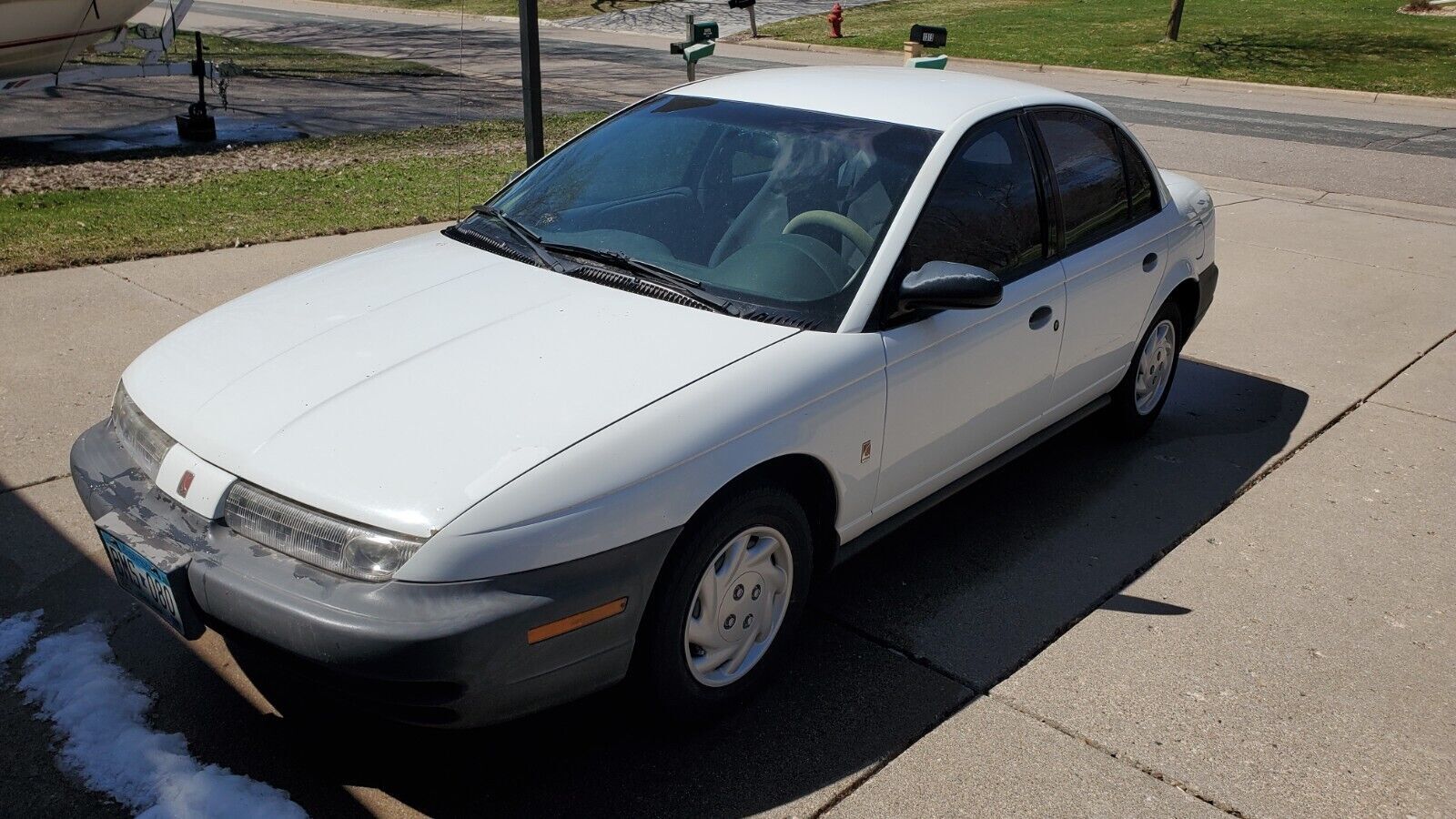 Saturn SL