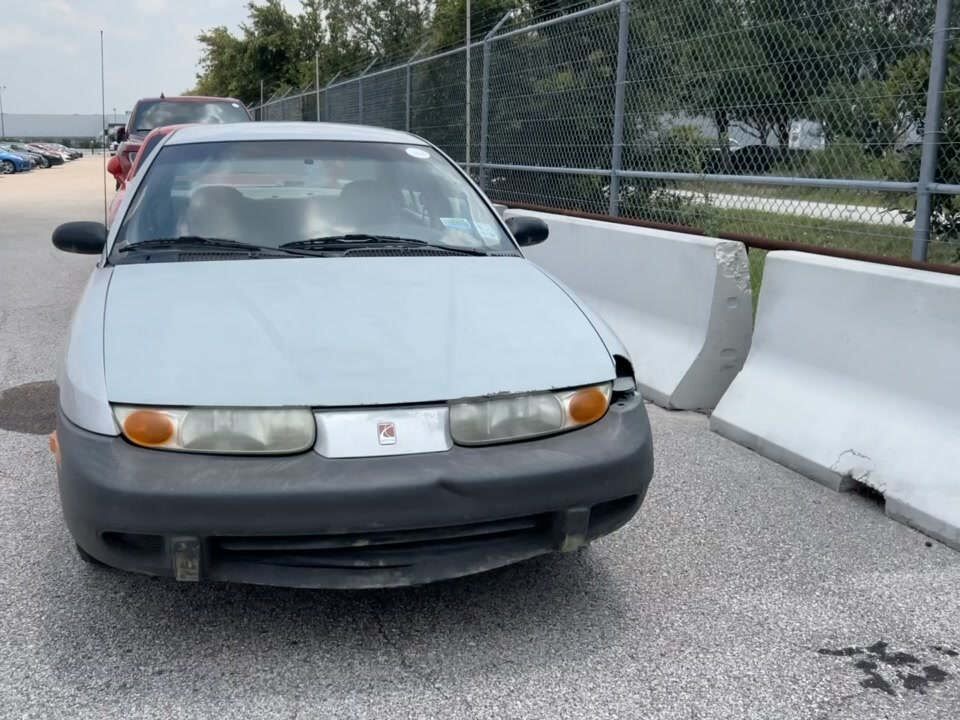 Saturn SL