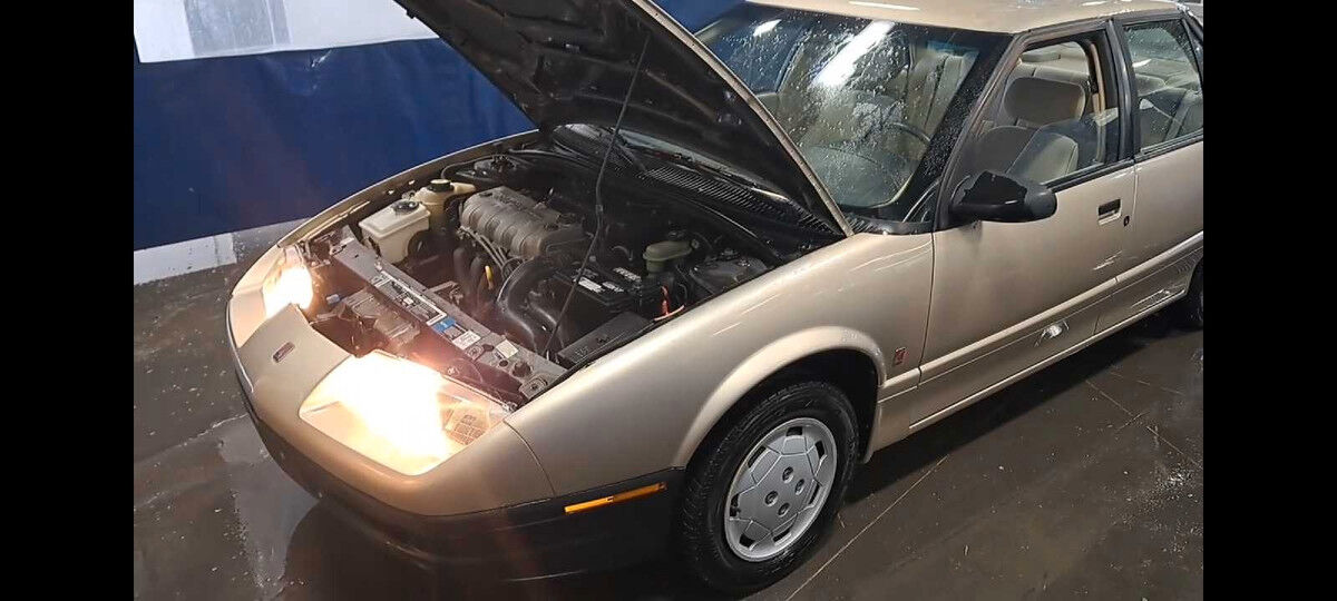Saturn SL