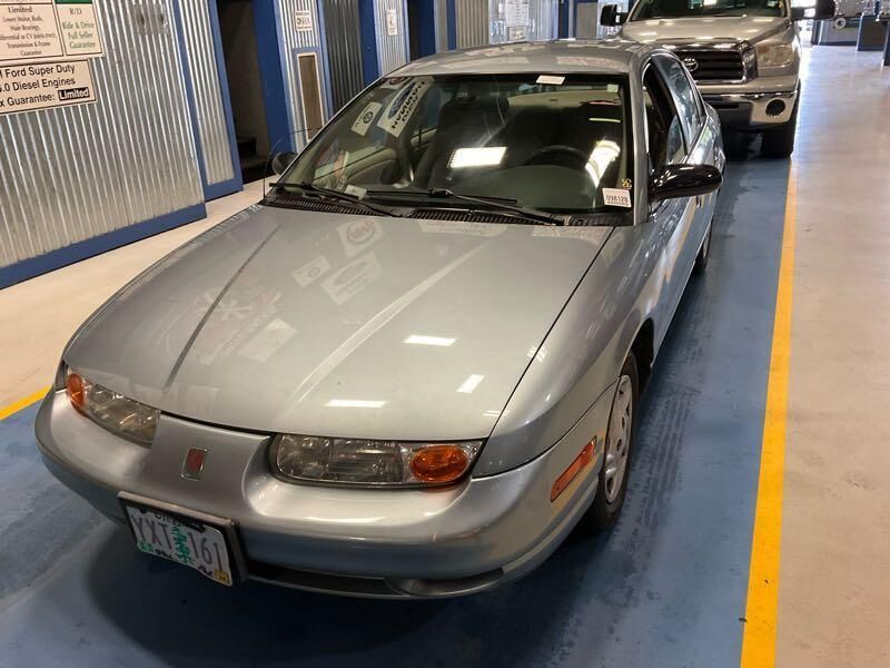 Saturn SL
