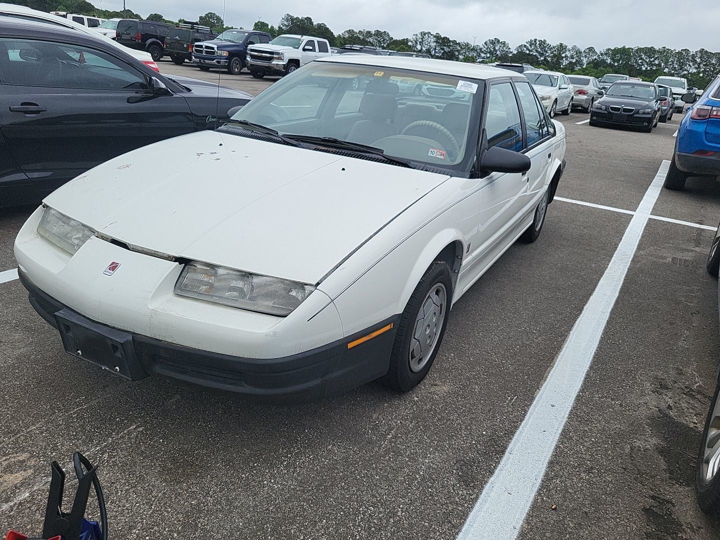 Saturn SL1