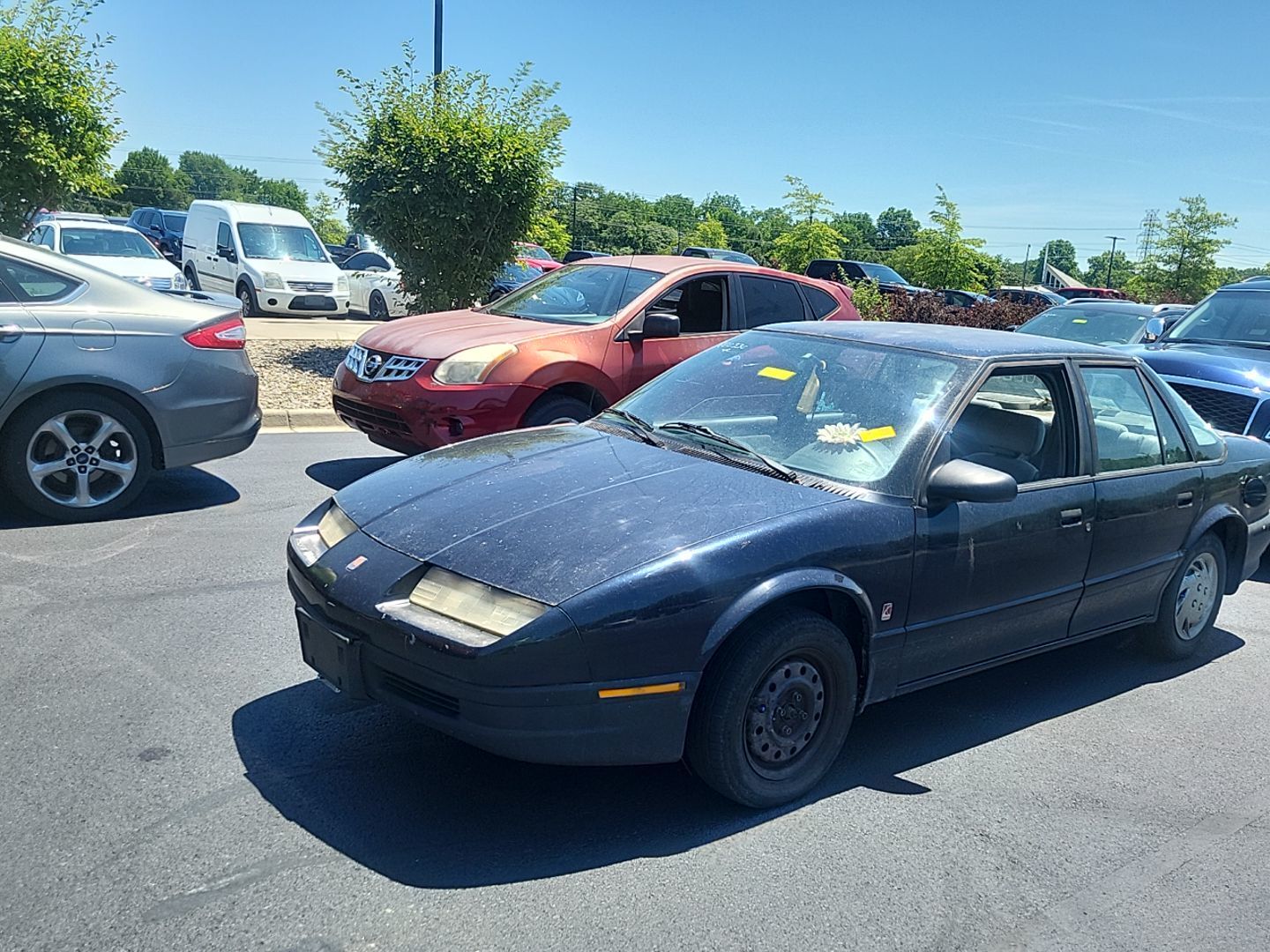 Saturn SL