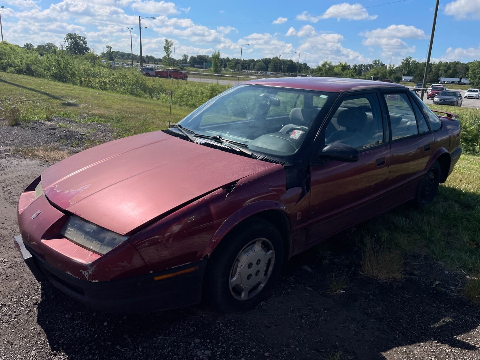 Saturn SL1