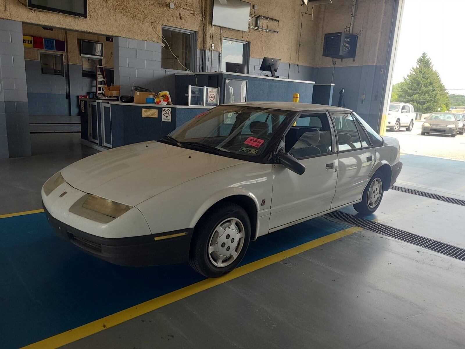 Saturn SL1