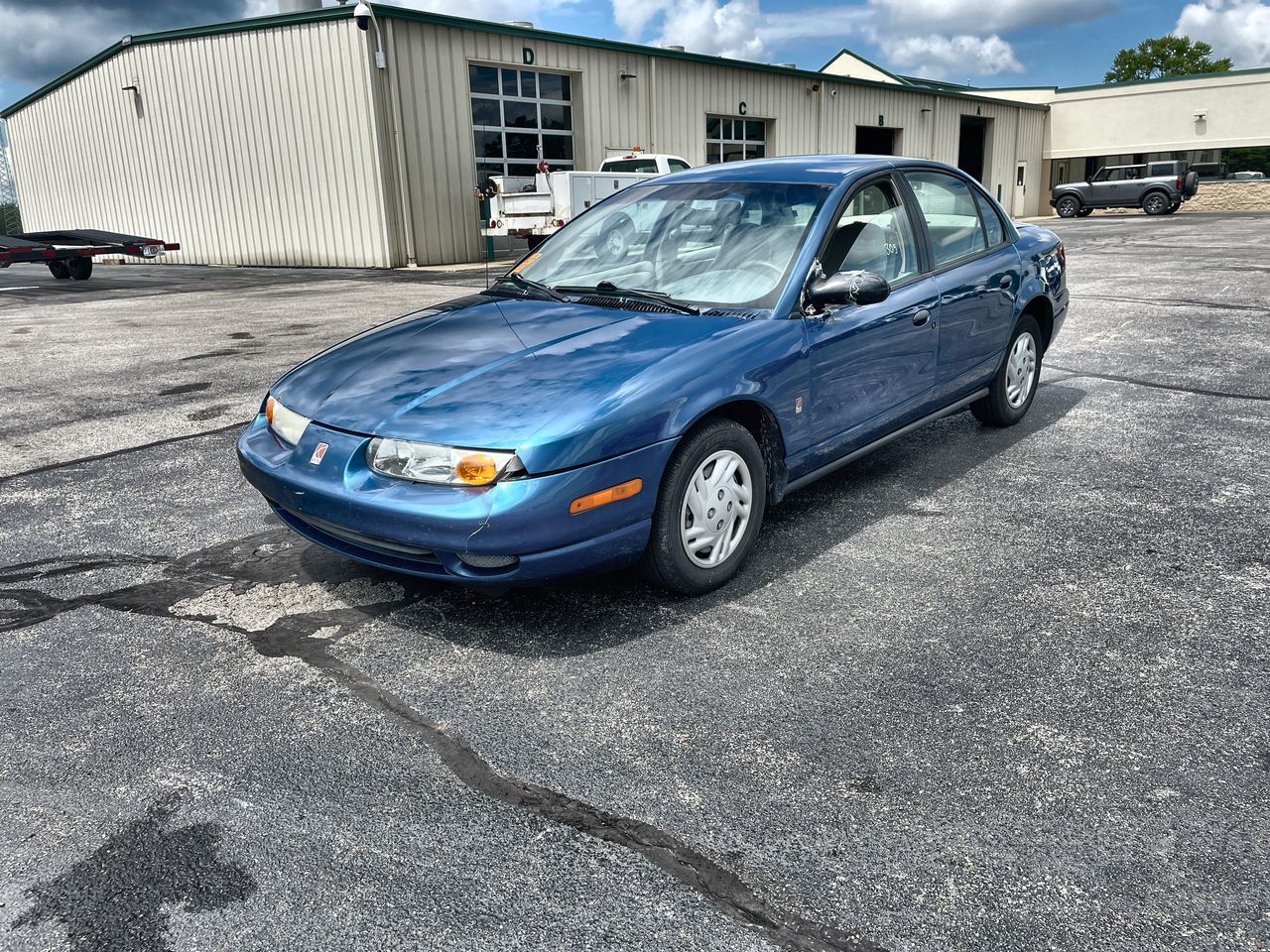 Saturn SL