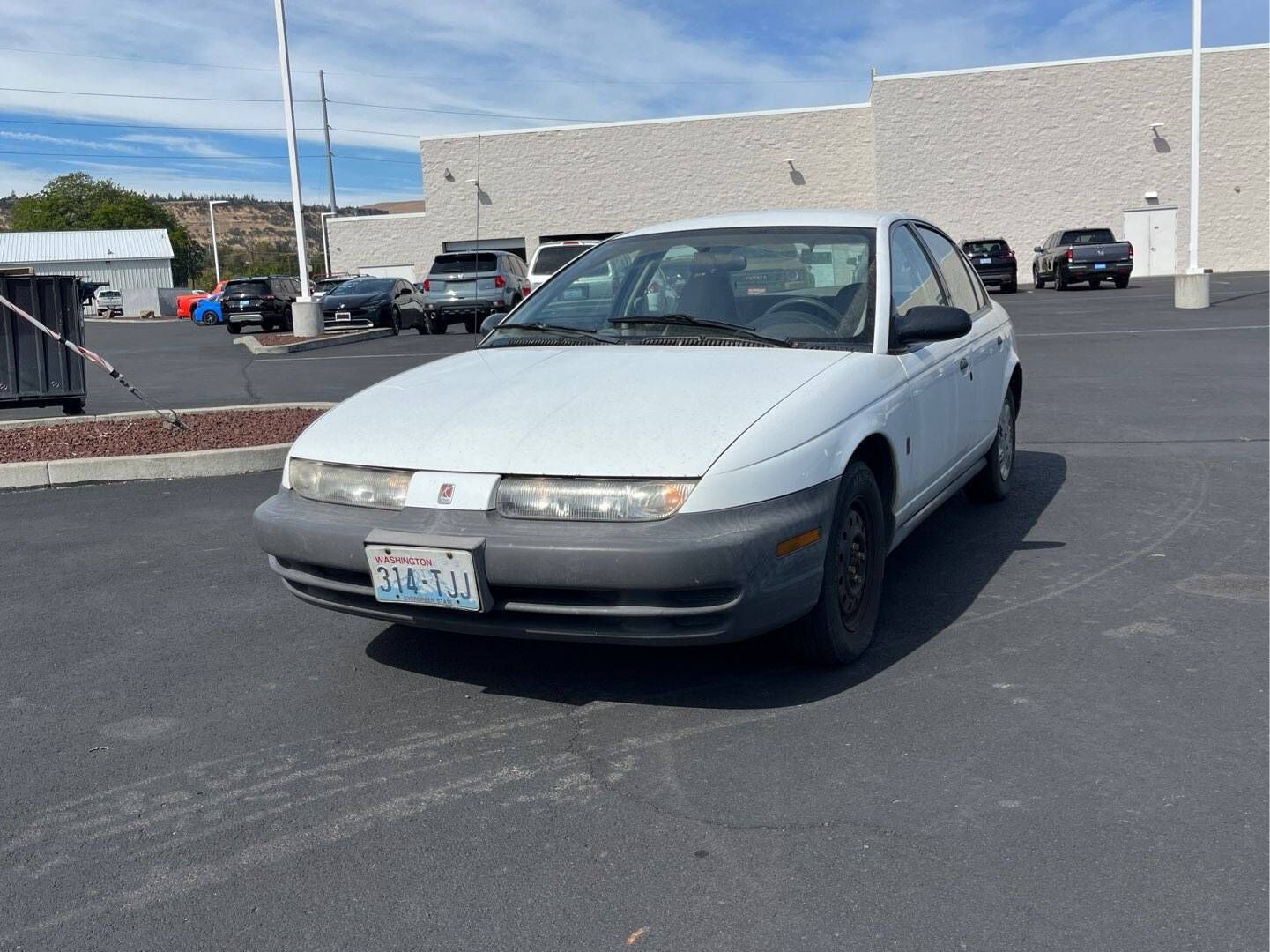 Saturn SL1