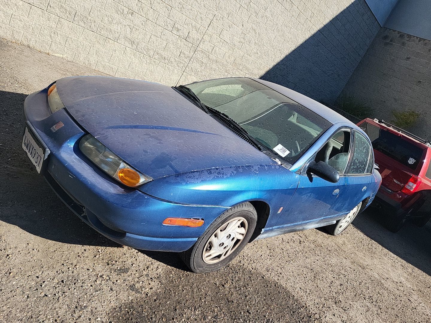 Saturn SL