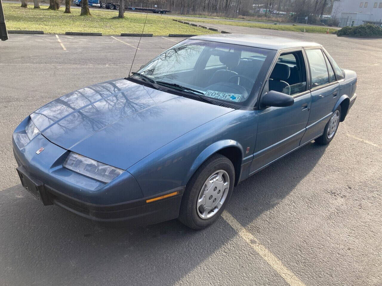 Saturn SL1