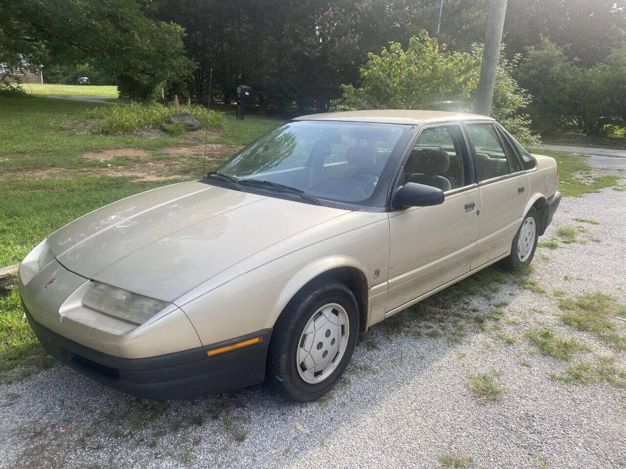 Saturn SL
