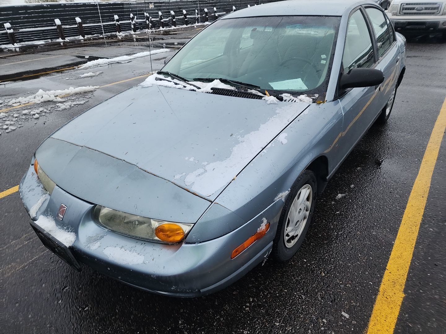 Saturn SL