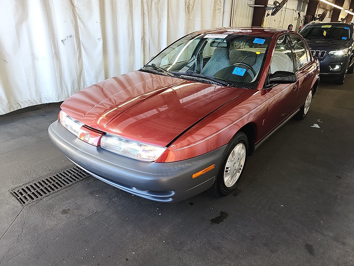 Saturn SL1