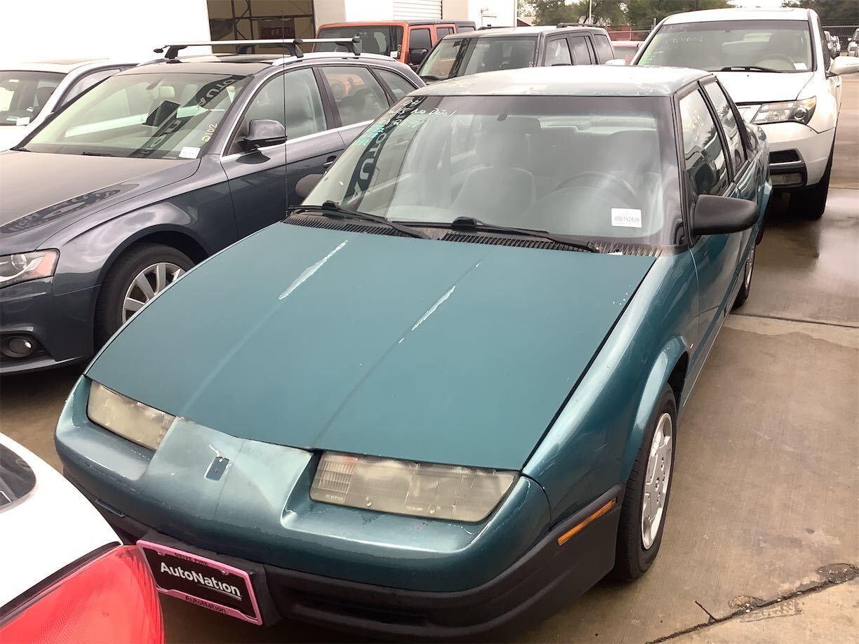 Saturn SL1