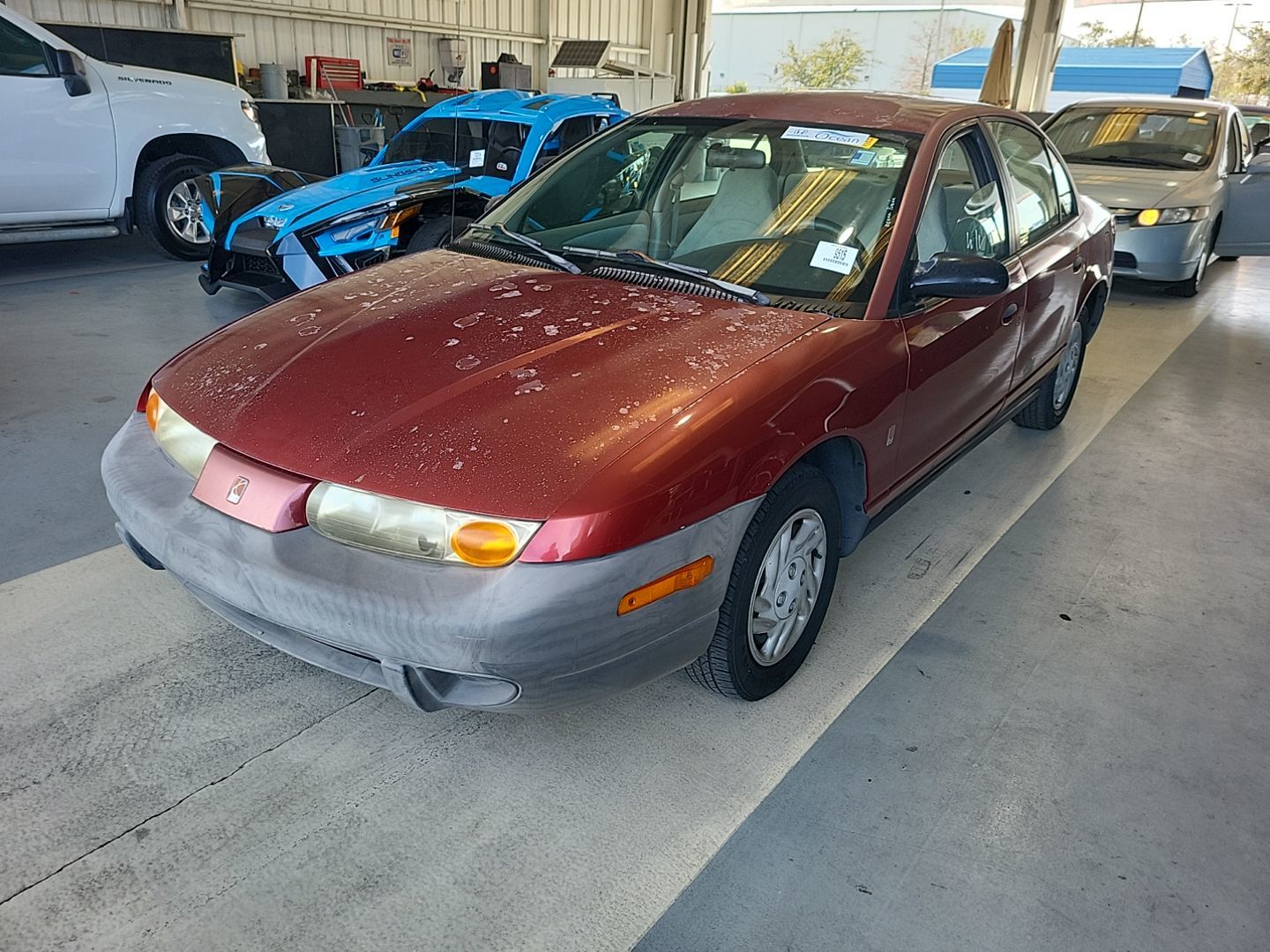 Saturn SL