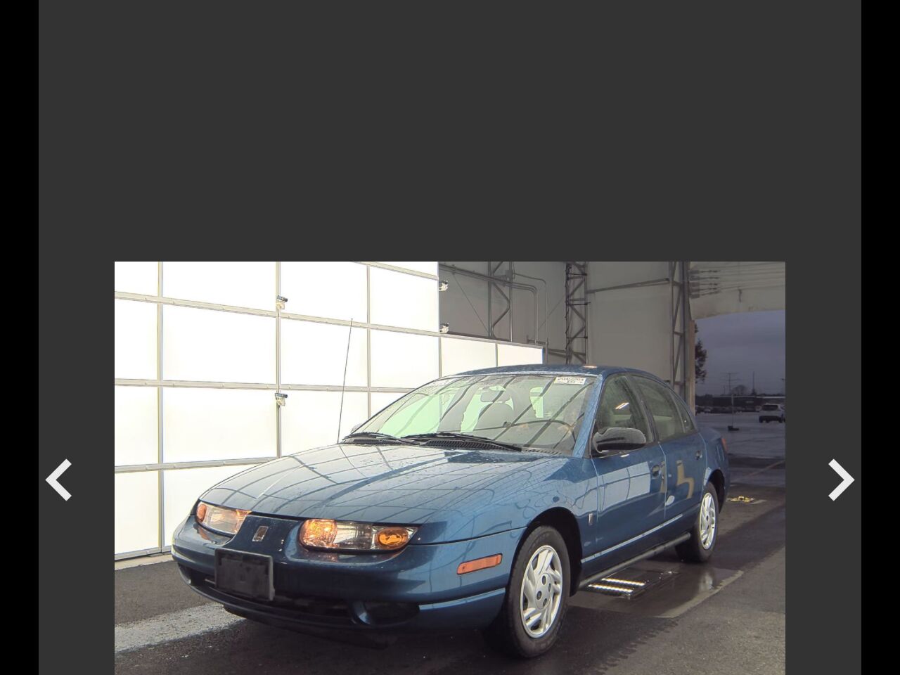 Saturn SL