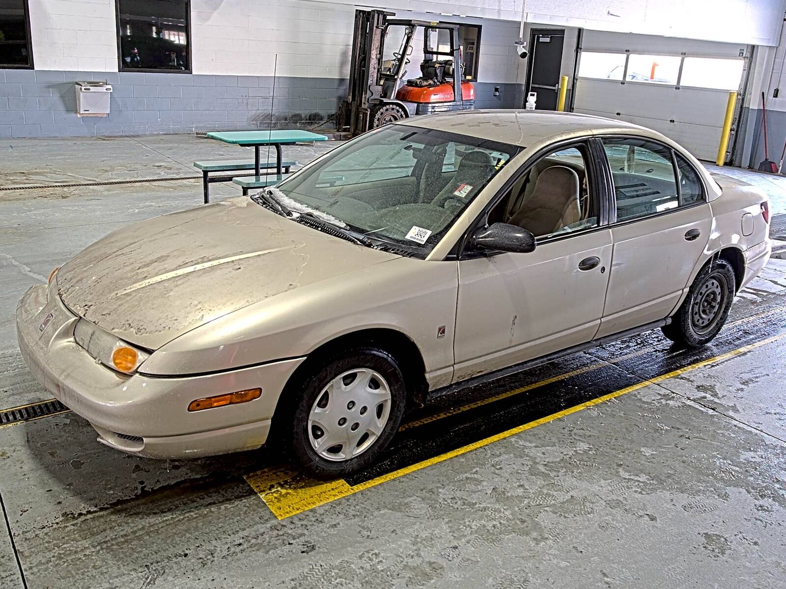 Saturn SL1