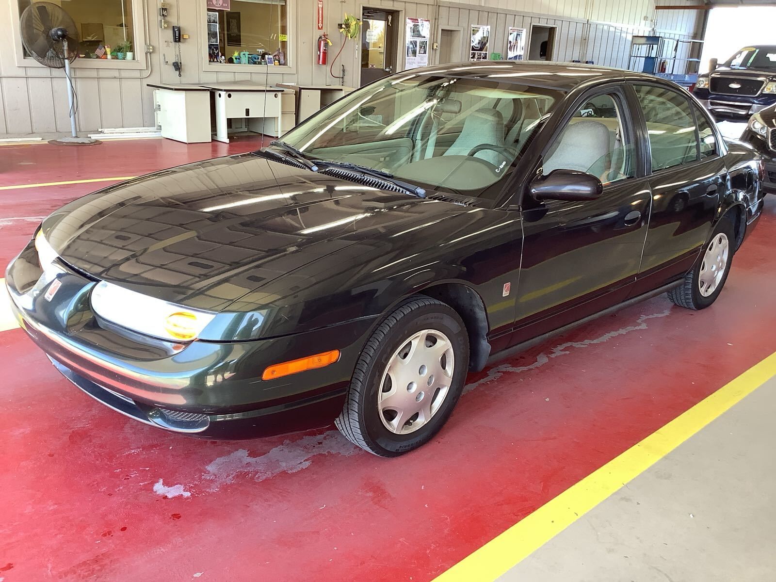 Saturn SL1