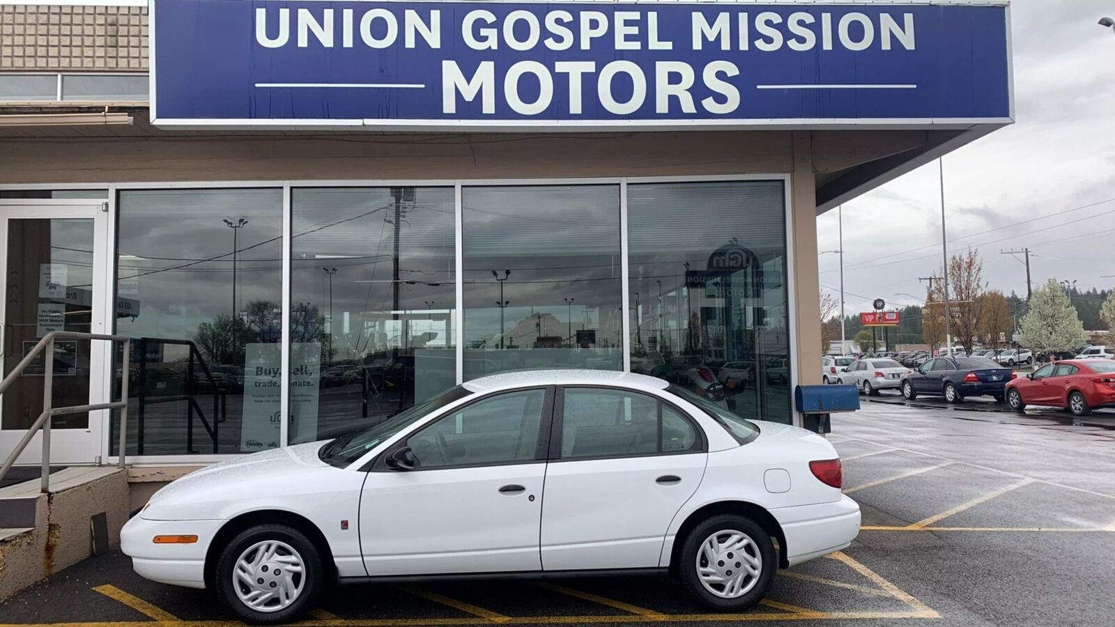 Saturn SL