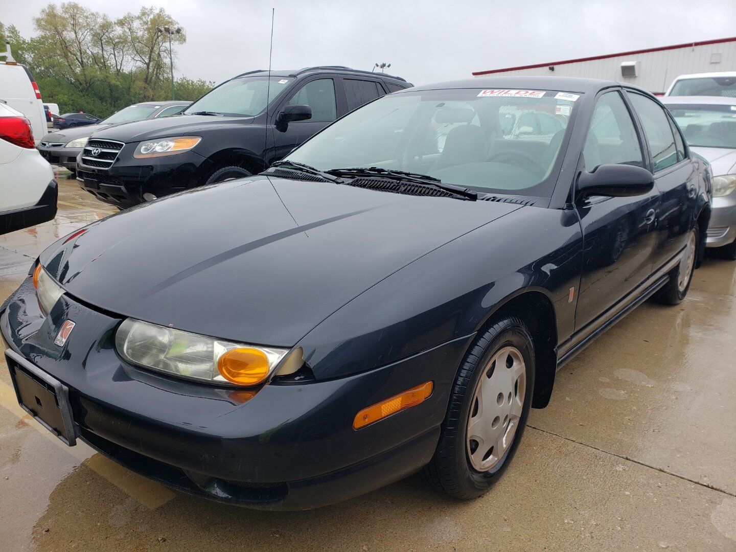 Saturn SL1
