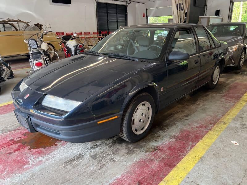 Saturn SL