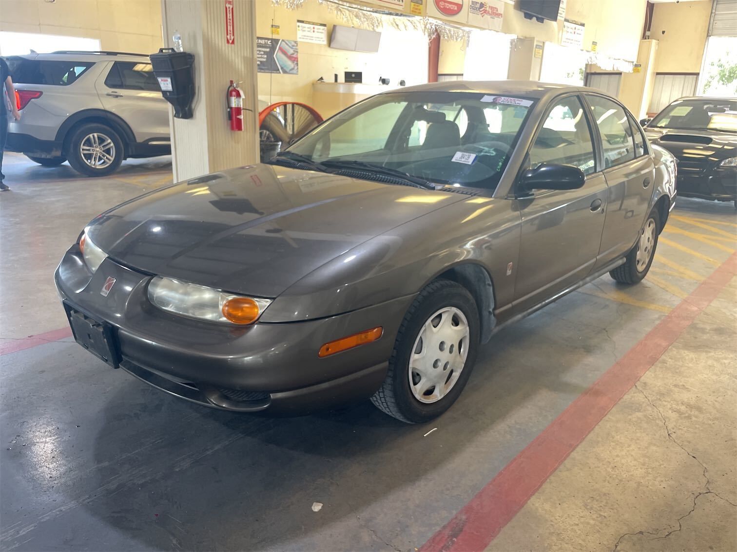 Saturn SL1