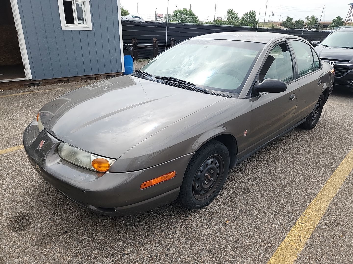 Saturn SL1