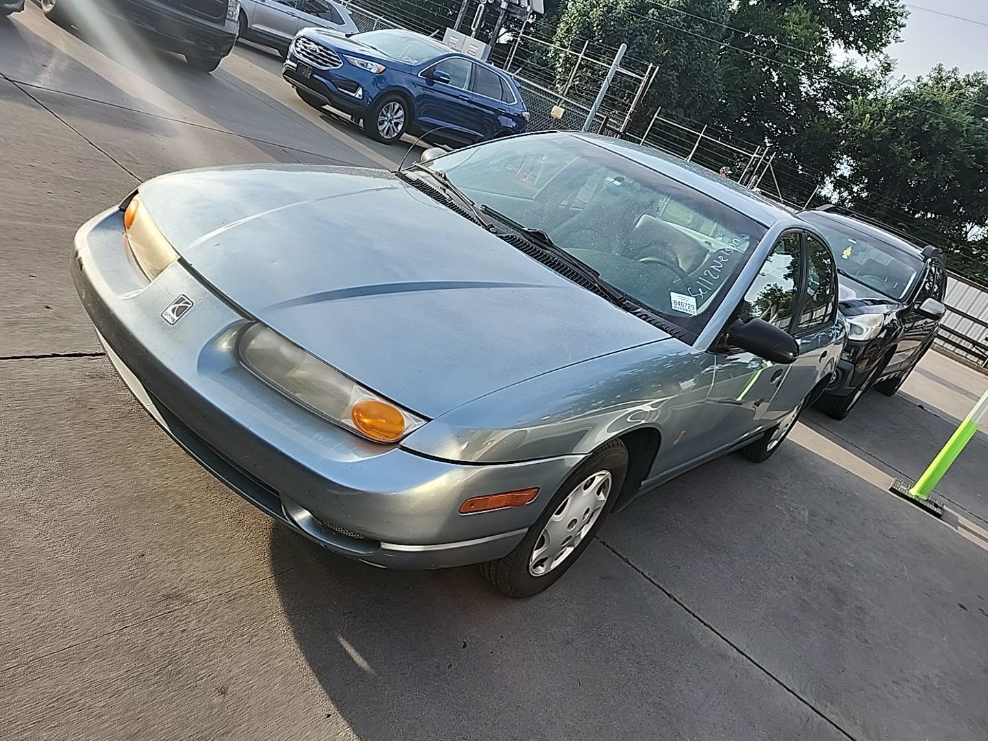 Saturn SL1
