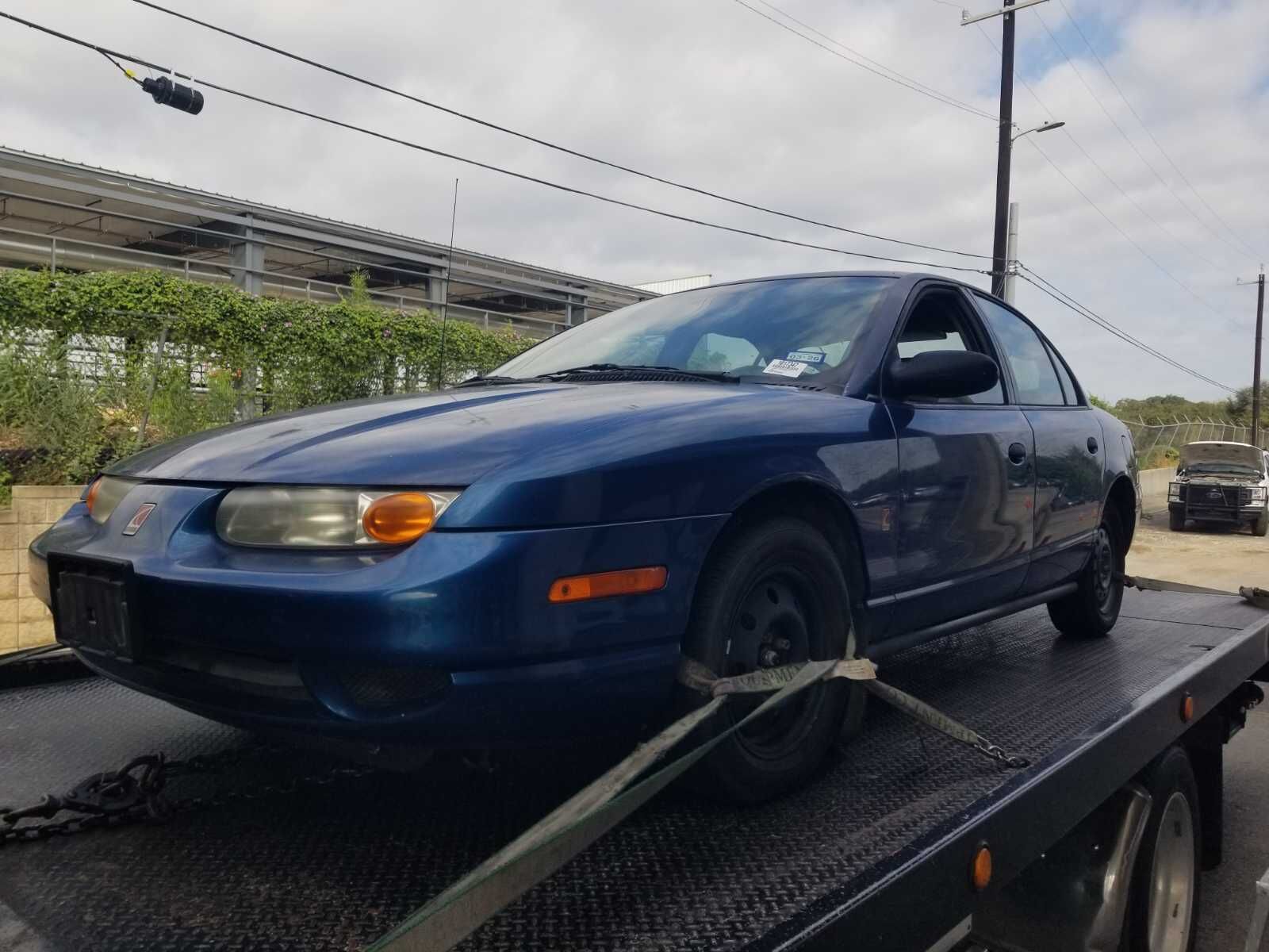 Saturn SL