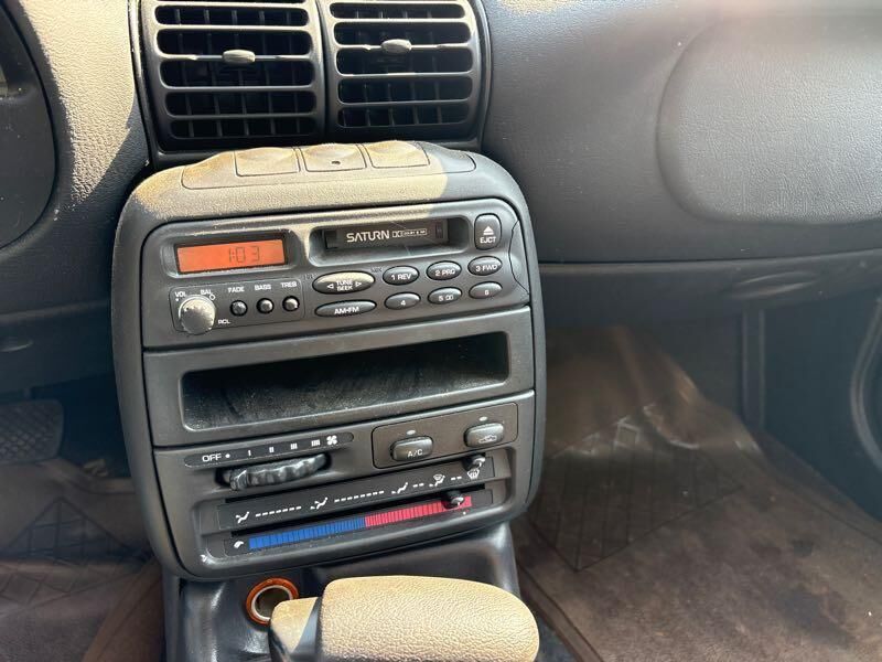 Saturn SL1
