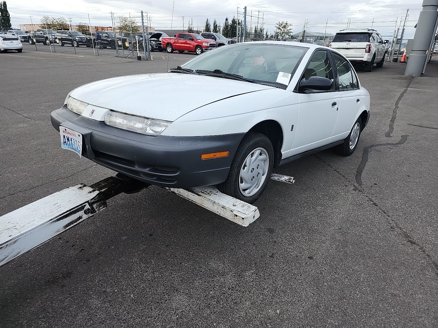 Saturn SL
