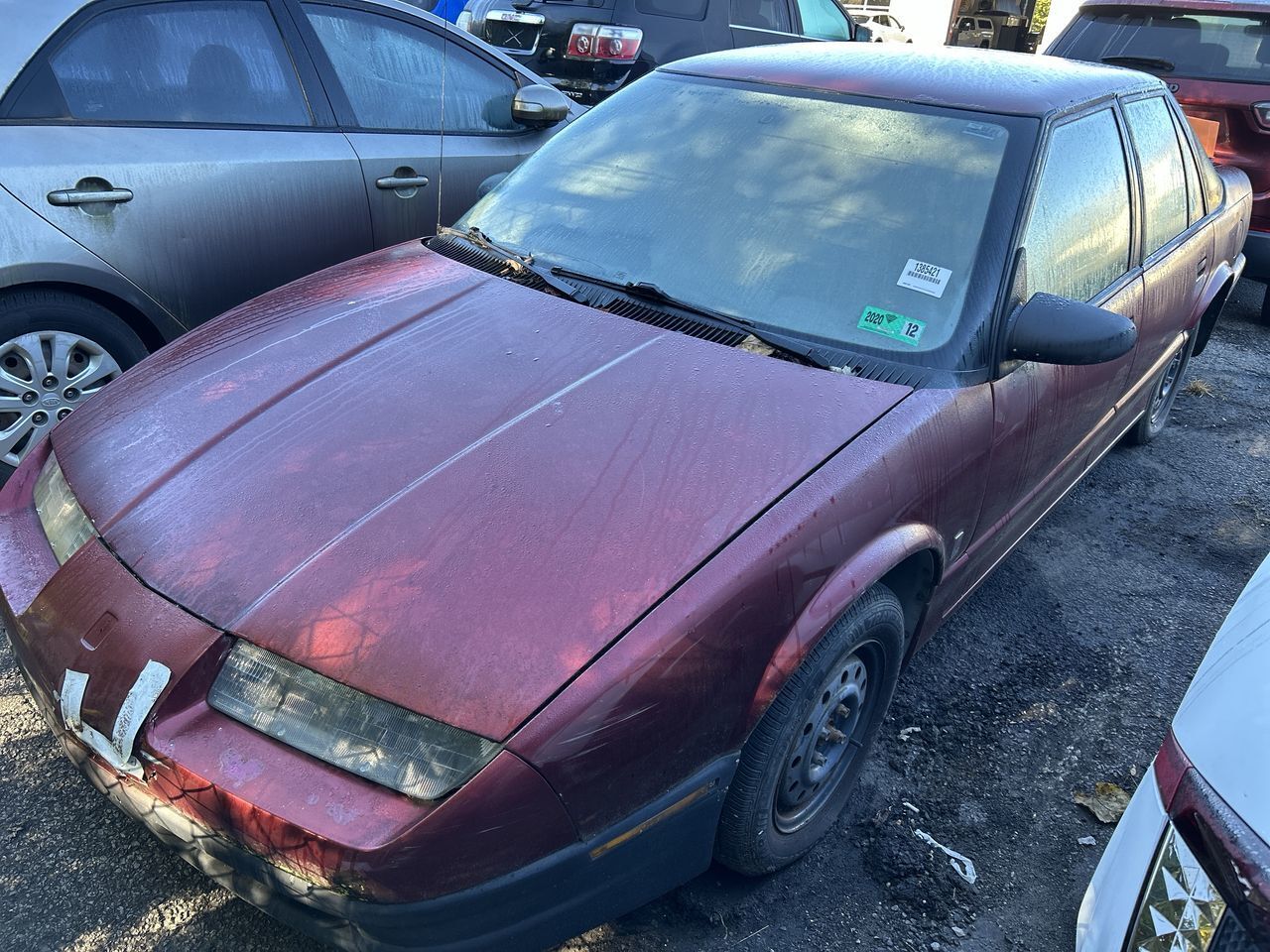 Saturn SL1