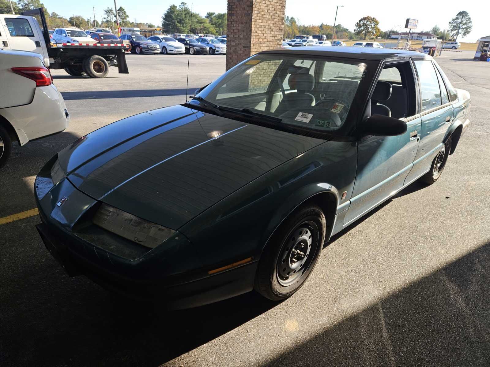 Saturn SL1