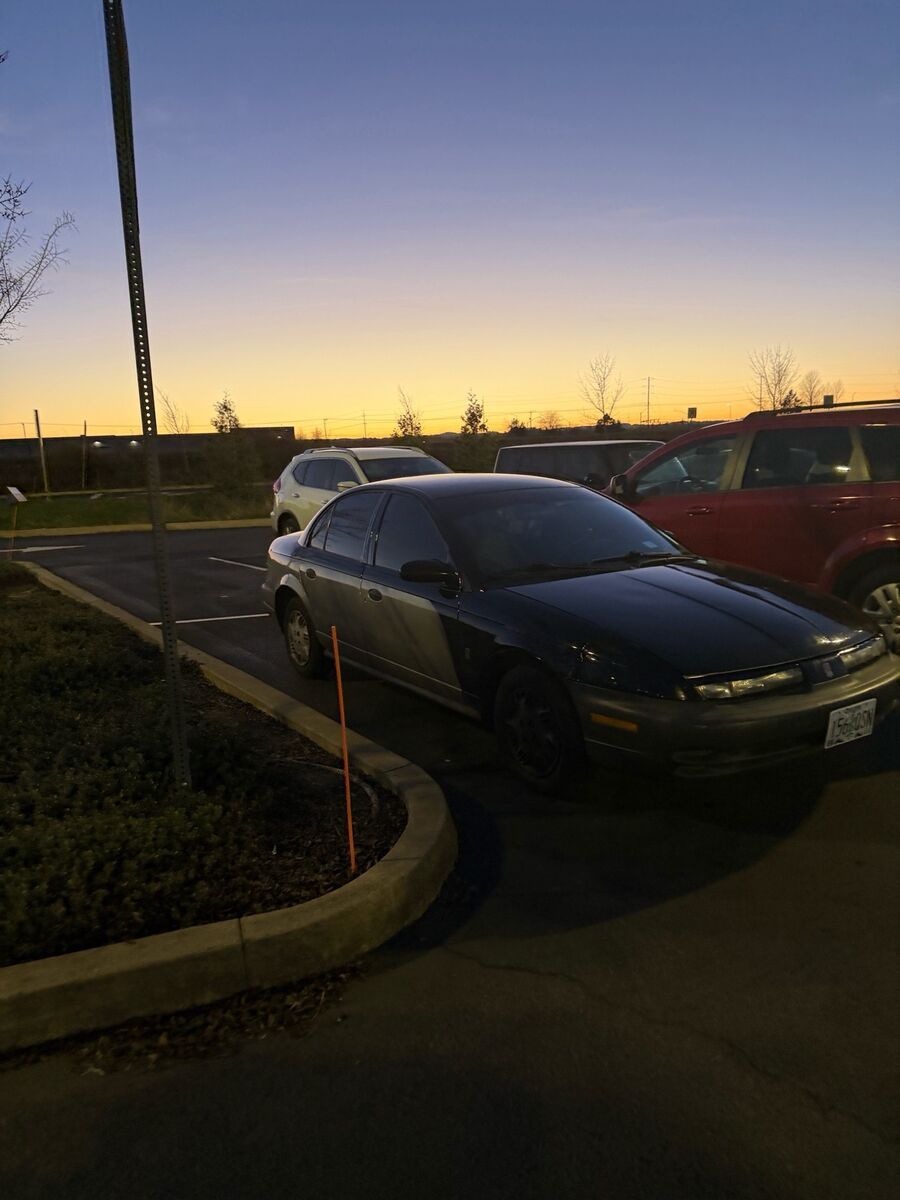 Saturn SL1